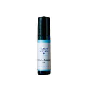 What specific part of the foot should you apply Vibrant Blue Oils Immune Support at bedtime?